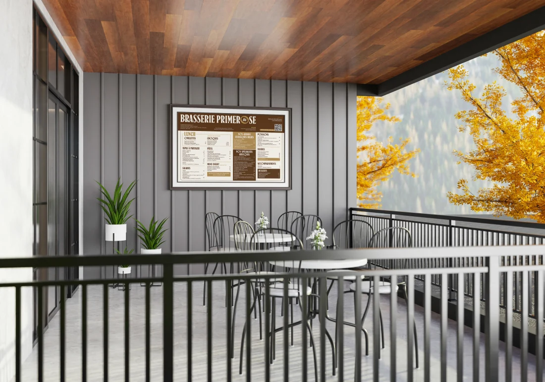 Primerose menu signage mounted beside an outdoor restaurant terrace.